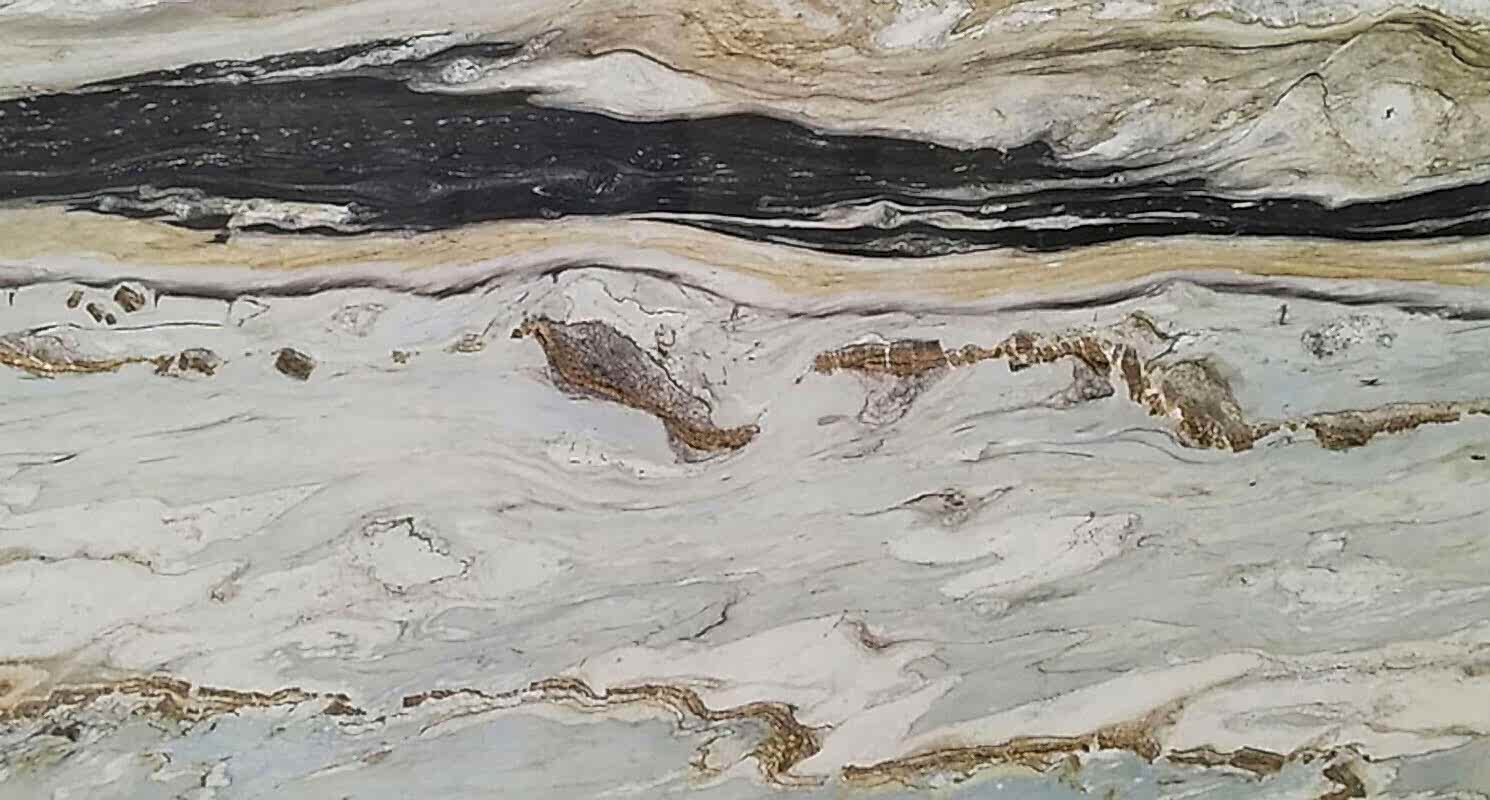 Mavi ve gri tonlarının zarif bir uyum içinde bir araya geldiği bu mermer, üzerindeki ince beyaz damarlarla huzurlu ve sofistike bir görünüm sunar. Özellikle modern ve şık mekanlarda tercih edilir.